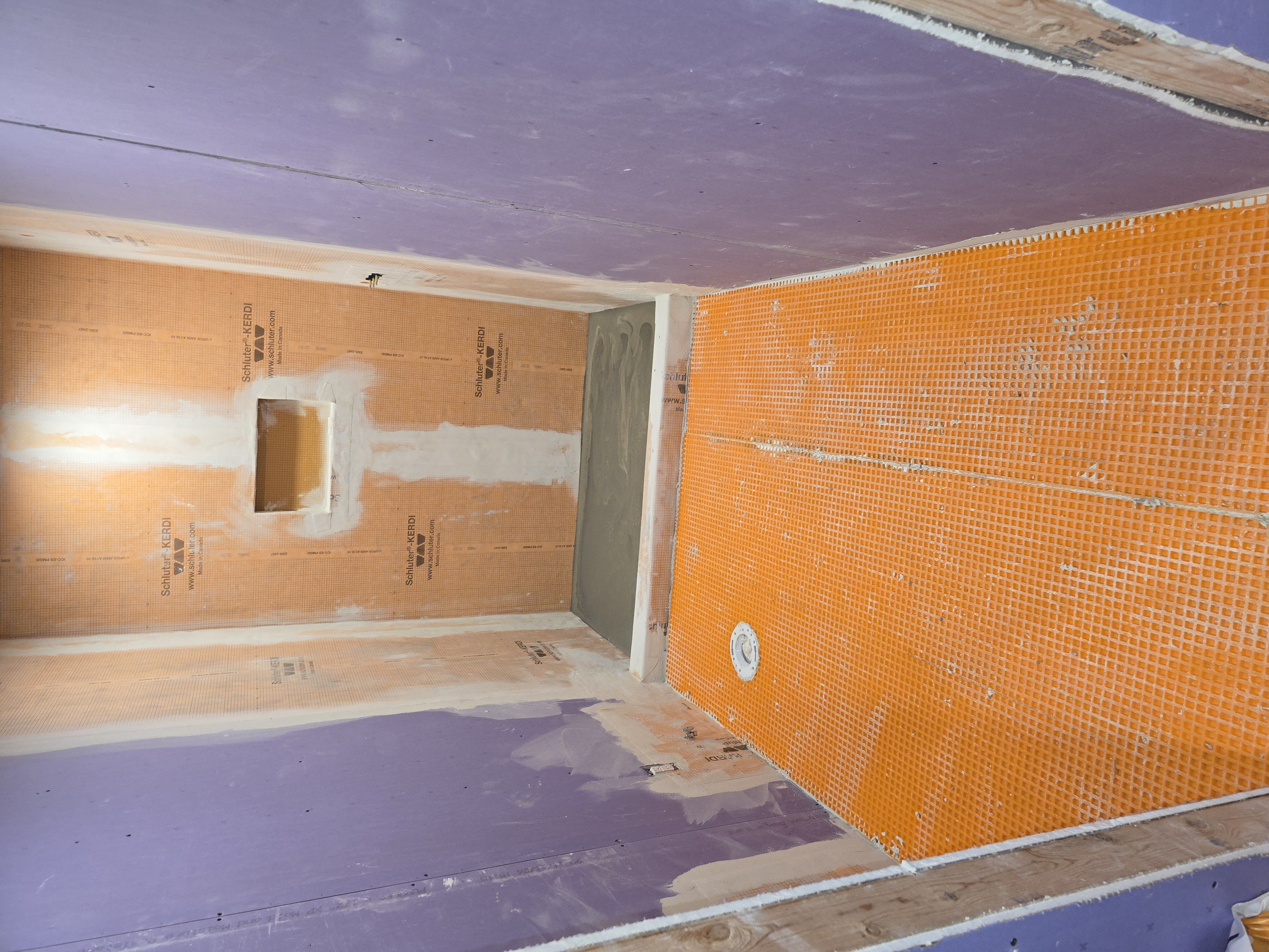 Walk-in shower before — framed and fully waterproofed with a Schluter Kerdi system