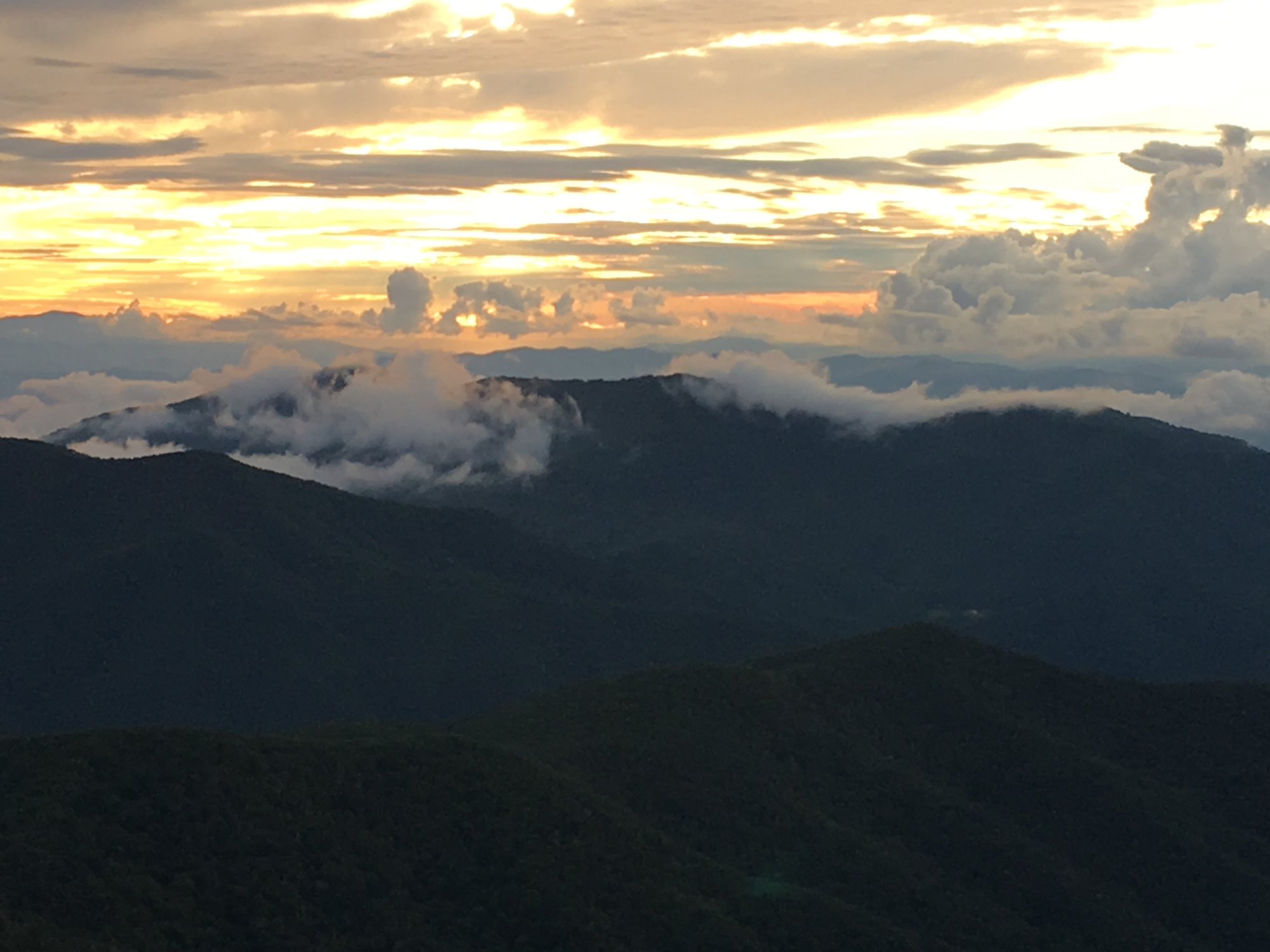 Storm clouds over NC High Country mountain ridges